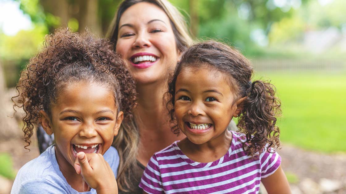 happy mother and daughters